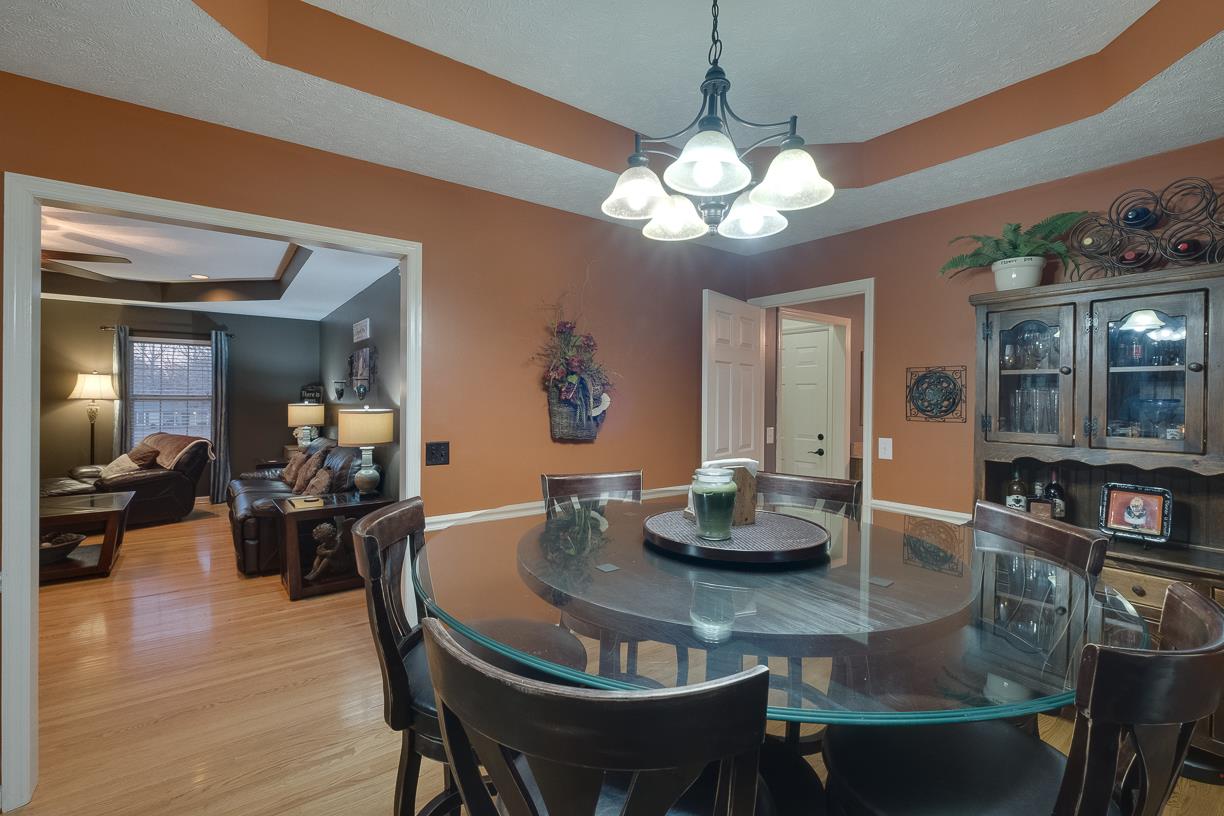203 Link Road Cottontown, TN 37048 - Photo 20 of 30 a view of a dining room with furniture and wooden floor