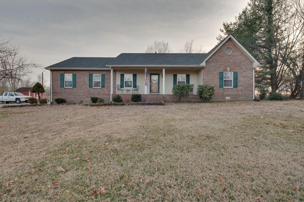 203 Link Road Cottontown, TN 37048 - Photo 2 of 30 a front view of a house with a yard