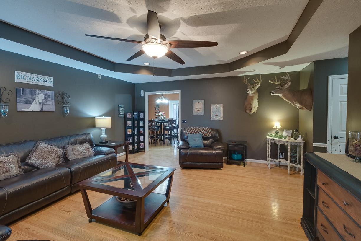 203 Link Road Cottontown, TN 37048 - Photo 5 of 30 a living room with furniture and a chandelier