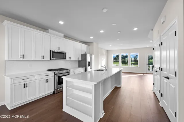 a view of a room with racks on the wall