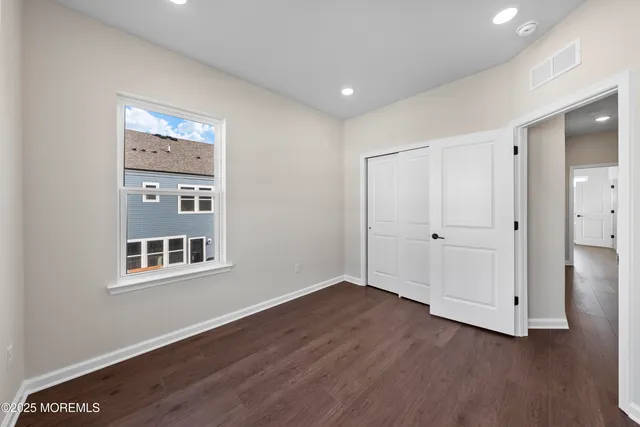 a view of a street with cars