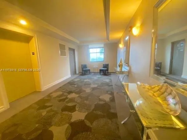 a spacious bathroom with a mirror and a shower