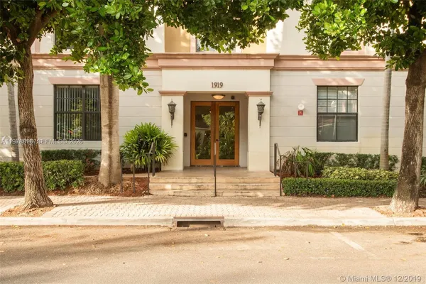 front view of a house with a patio