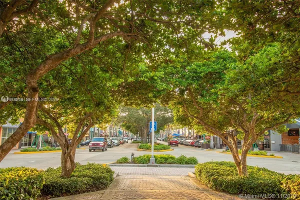 a sign board with yard in front of it