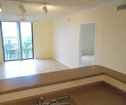 a view of a room with an empty space