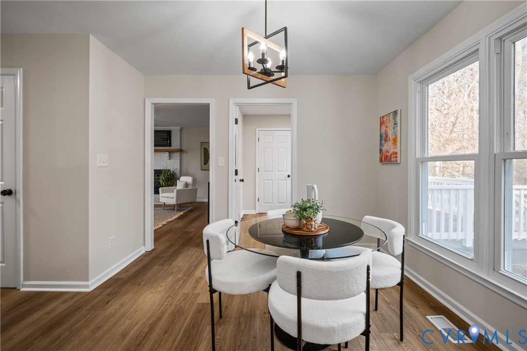 15101 Loving Union Road Disputanta, VA 23842 - Photo 23 of 50 a dining room with furniture and window