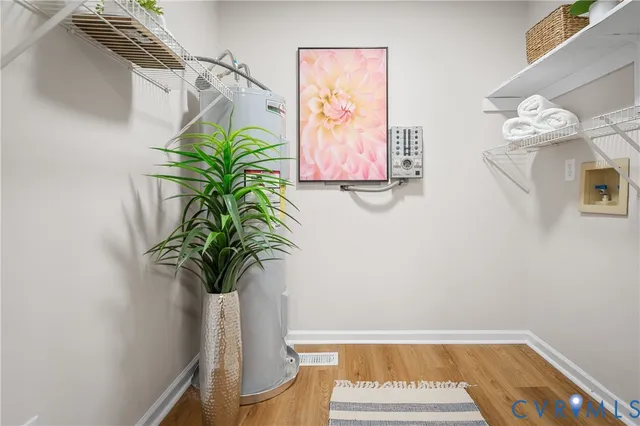 a workspace with furniture and wooden floor