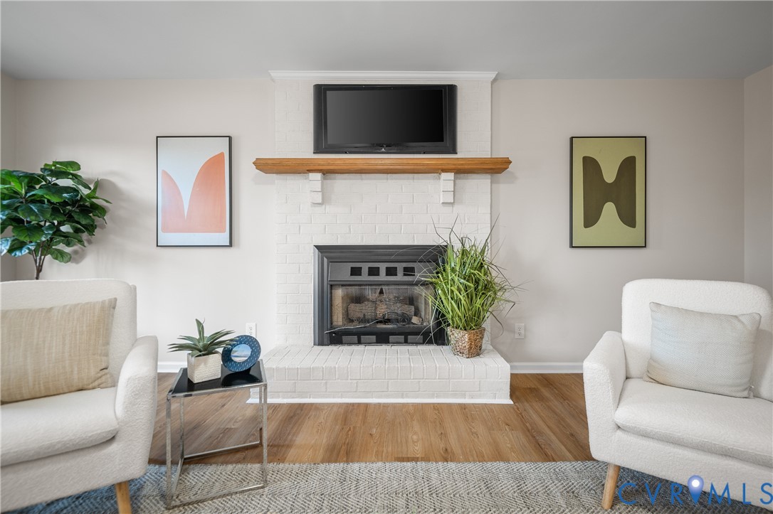15101 Loving Union Road Disputanta, VA 23842 - Photo 10 of 50 a living room with furniture and a fireplace