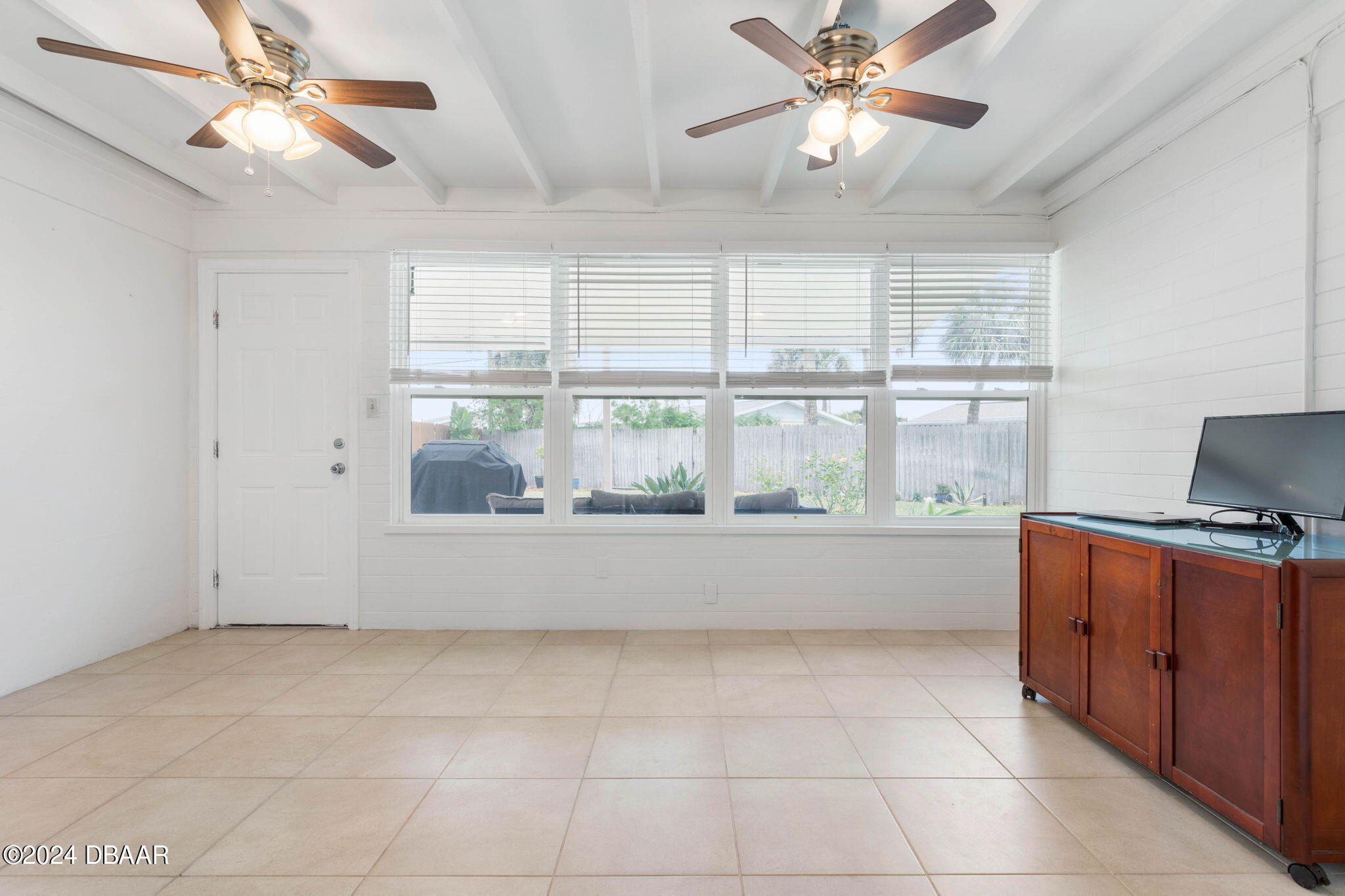 9 Palm Drive Ormond Beach, FL 32176 - Photo 15 of 47 a view of workspace with window and ceiling fan