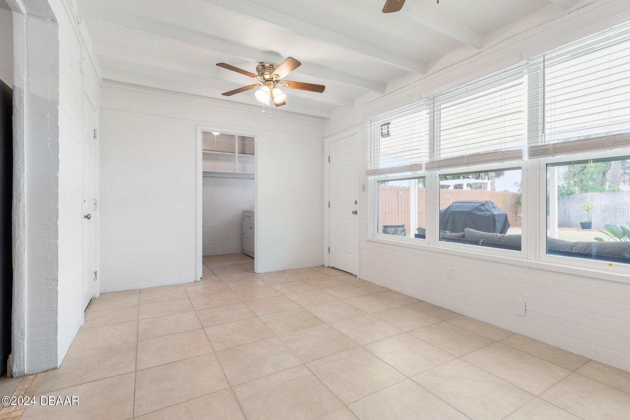 9 Palm Drive Ormond Beach, FL 32176 - Photo 16 of 47 a view of an empty room with a window