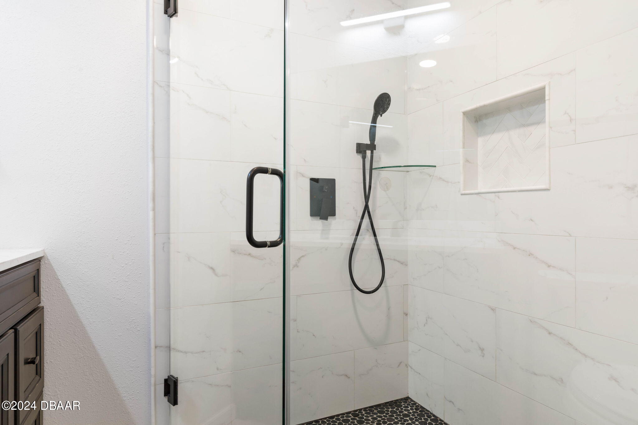 9 Palm Drive Ormond Beach, FL 32176 - Photo 24 of 47 a bathroom with a shower