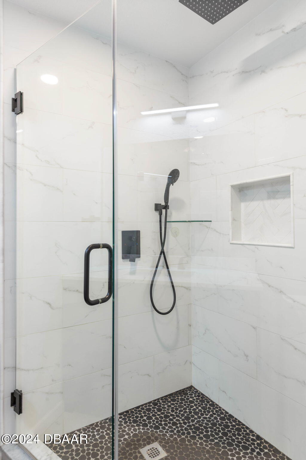 9 Palm Drive Ormond Beach, FL 32176 - Photo 25 of 47 a bathroom with a shower