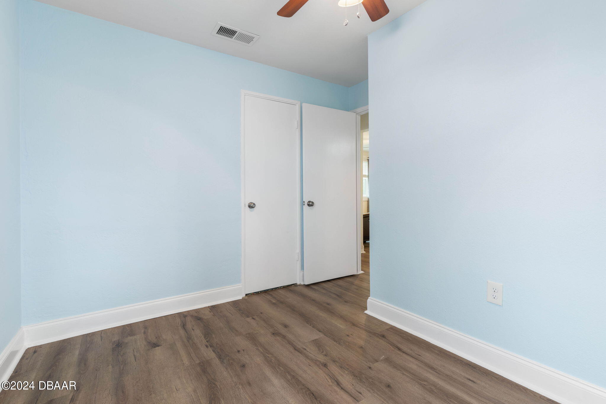 9 Palm Drive Ormond Beach, FL 32176 - Photo 27 of 47 wooden floor in an empty room