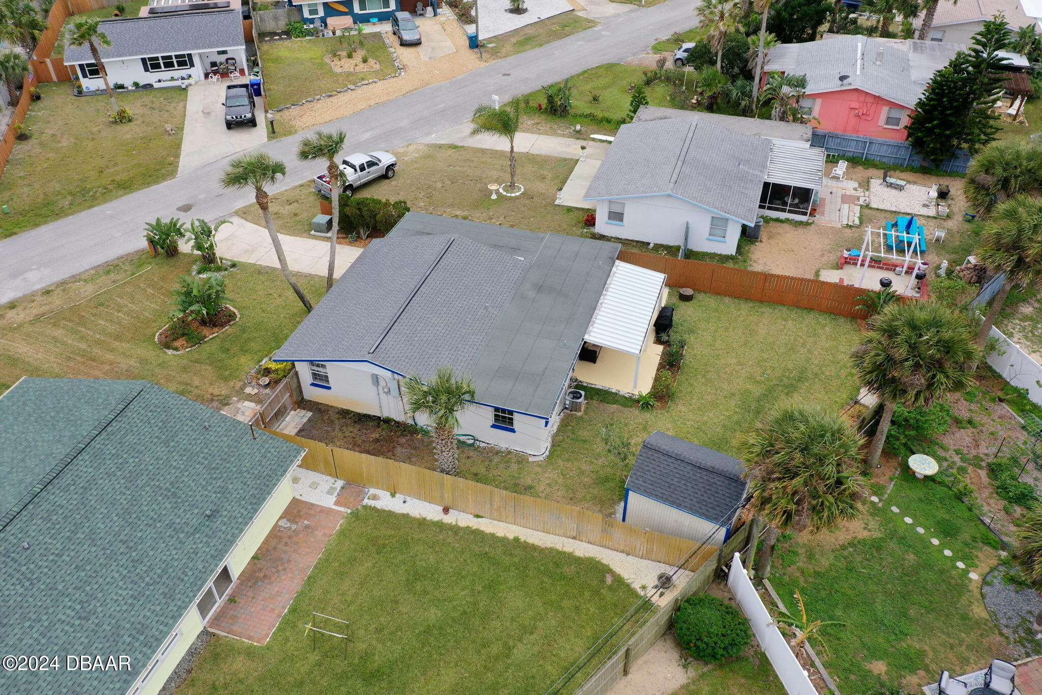 9 Palm Drive Ormond Beach, FL 32176 - Photo 41 of 47 an aerial view of residential houses with outdoor space and parking