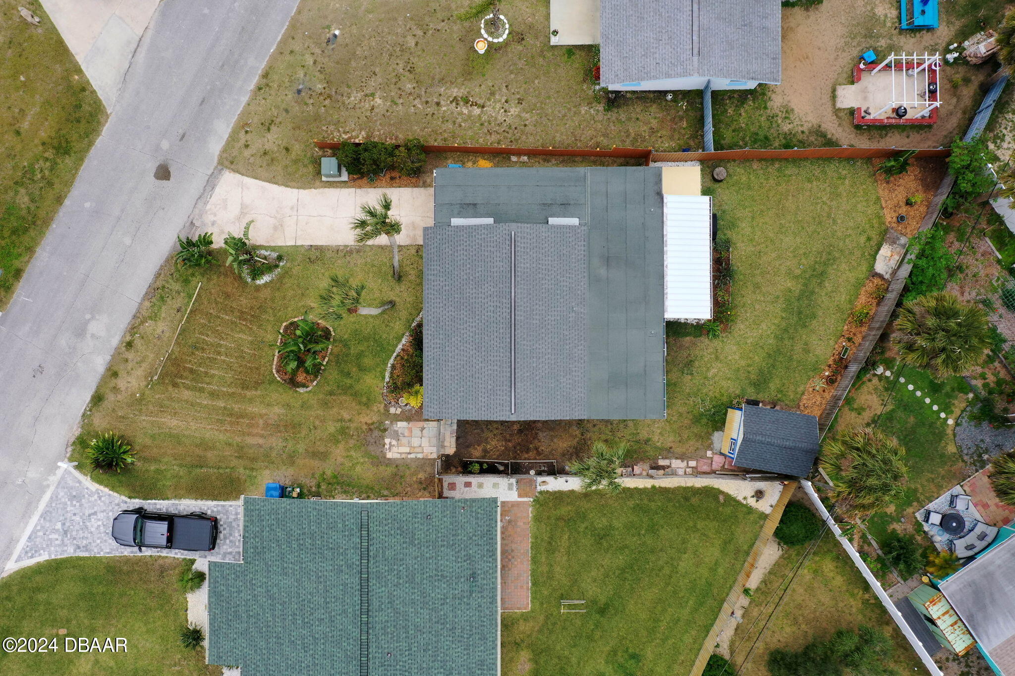 9 Palm Drive Ormond Beach, FL 32176 - Photo 42 of 47 an aerial view of a house with a yard