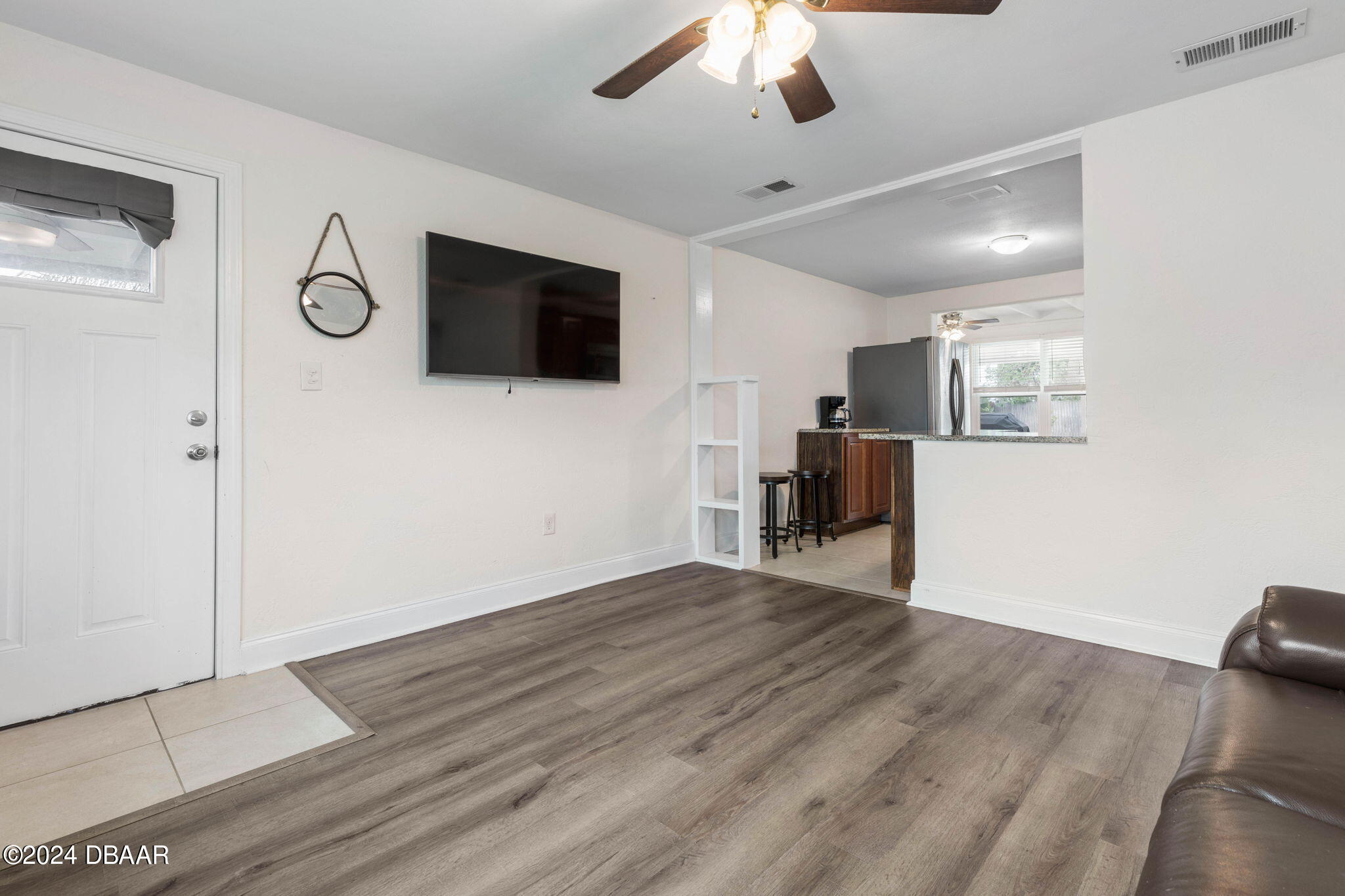 9 Palm Drive Ormond Beach, FL 32176 - Photo 9 of 47 a view of a livingroom with an empty space