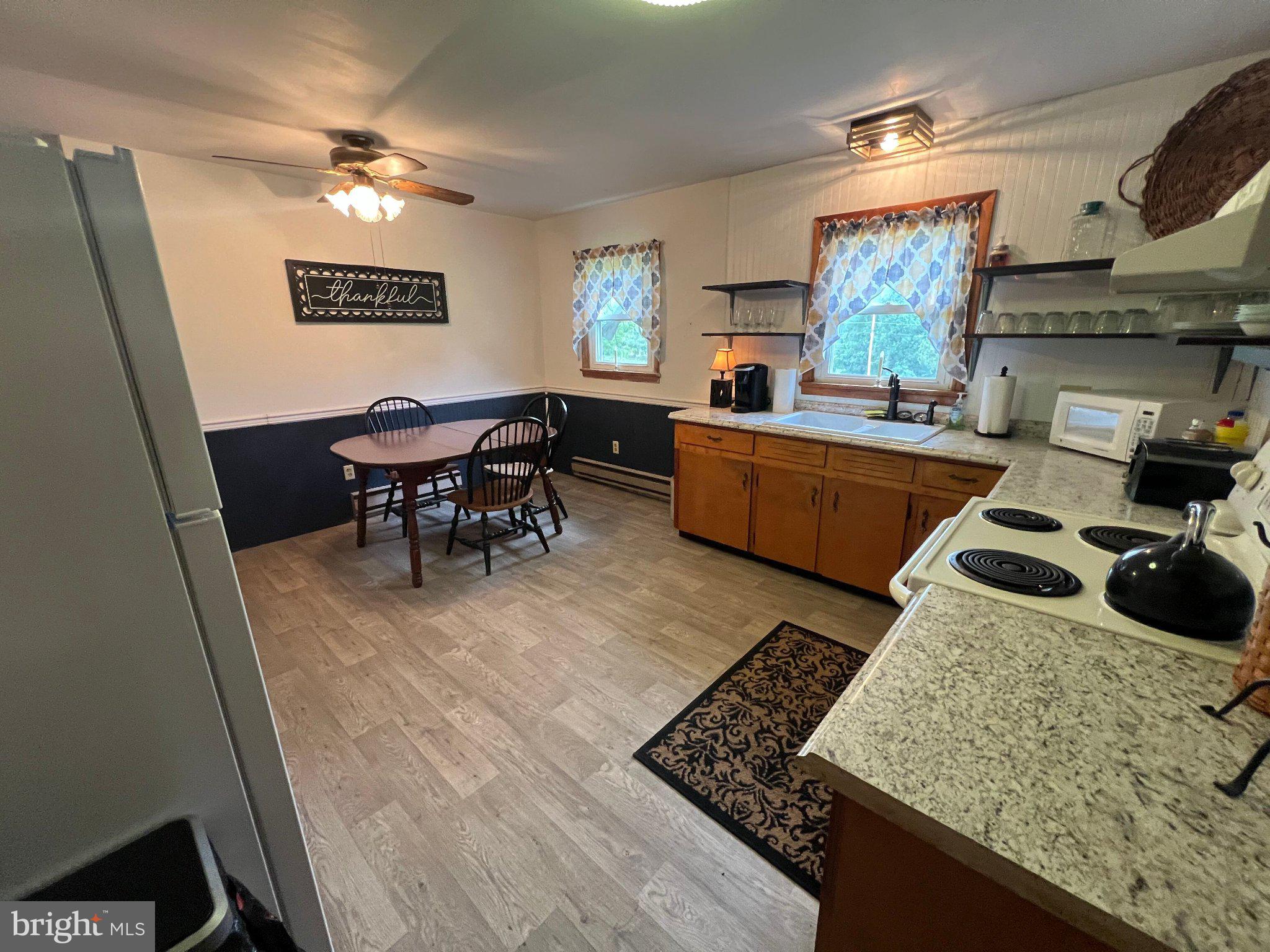 381 Co Rte 7/1 Augusta, WV 26704 - Photo 17 of 42 Cozy kitchen with inviting charm.