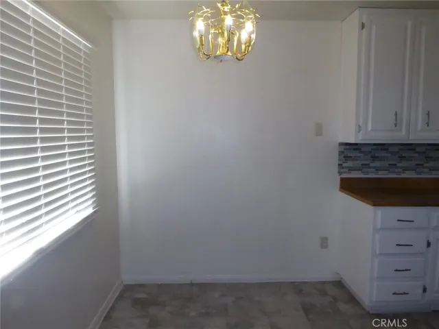 a view of an entryway with window