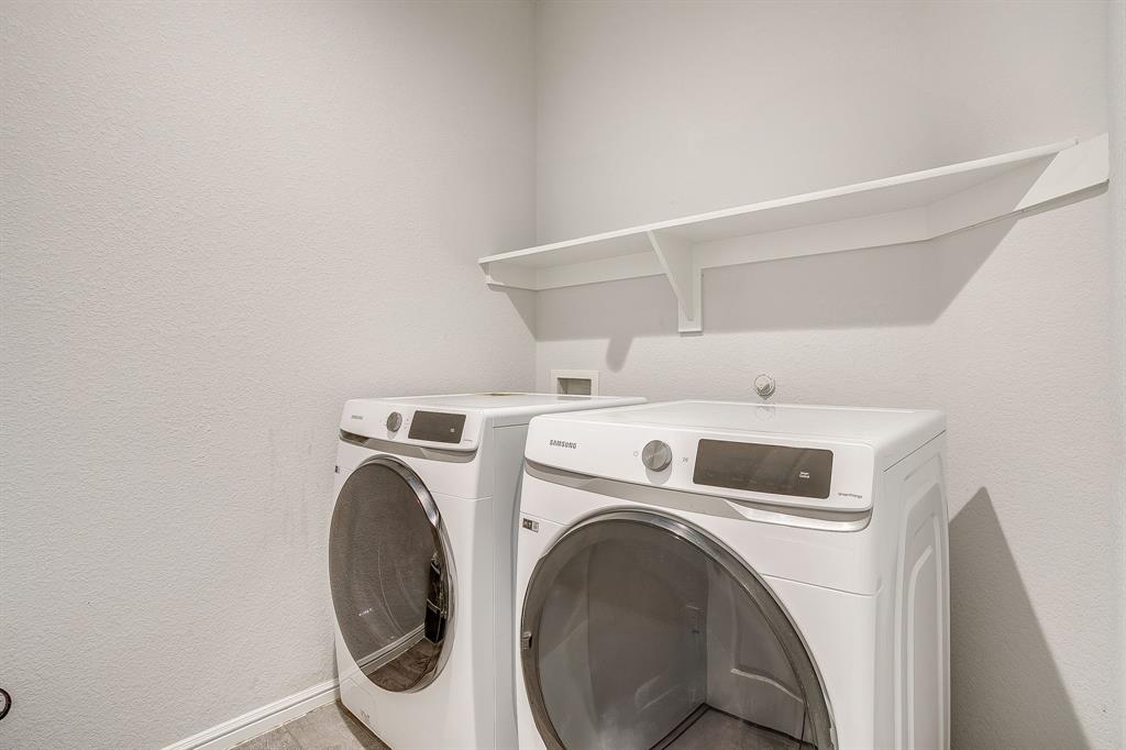 2313 Stallings Road Fort Worth, TX 76108 - Photo 26 of 30 a utility room with dryer and washer