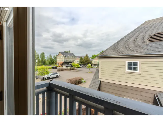 a view of swimming pool from a balcony