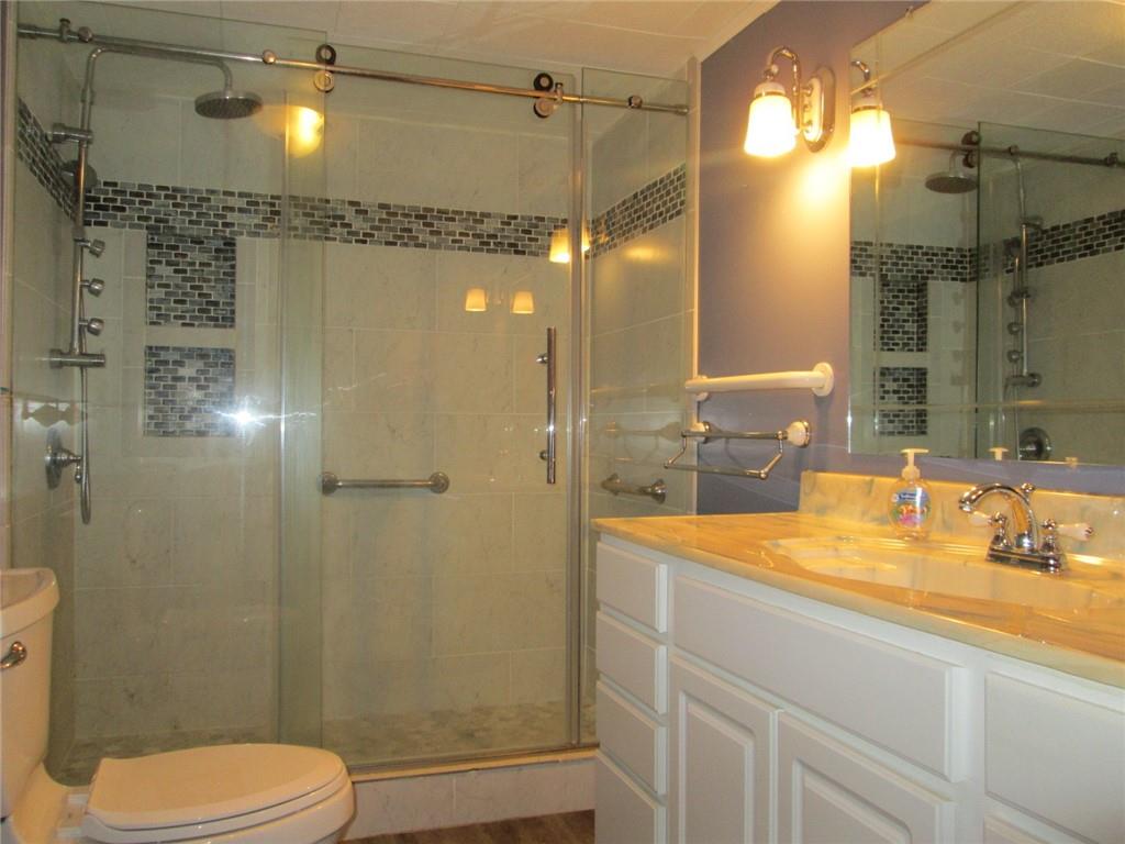 1778 Freeport Road Kittanning, PA 16201 - Photo 10 of 18 a bathroom with a sink a toilet and shower