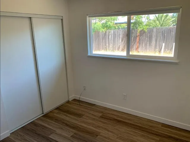 a view of small space with wooden floor