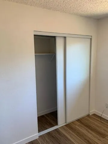 a bathroom with a sink a toilet and tub