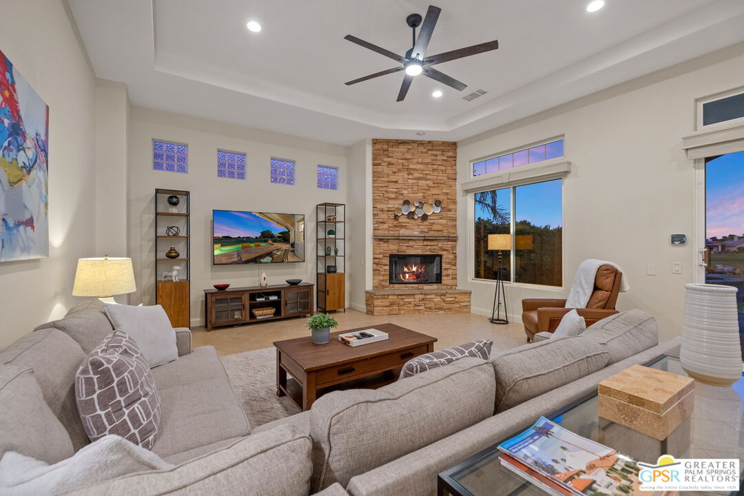 88 Vía Las Flores Rancho Mirage, CA 92270 - Photo 11 of 65 a living room with furniture and a flat screen tv