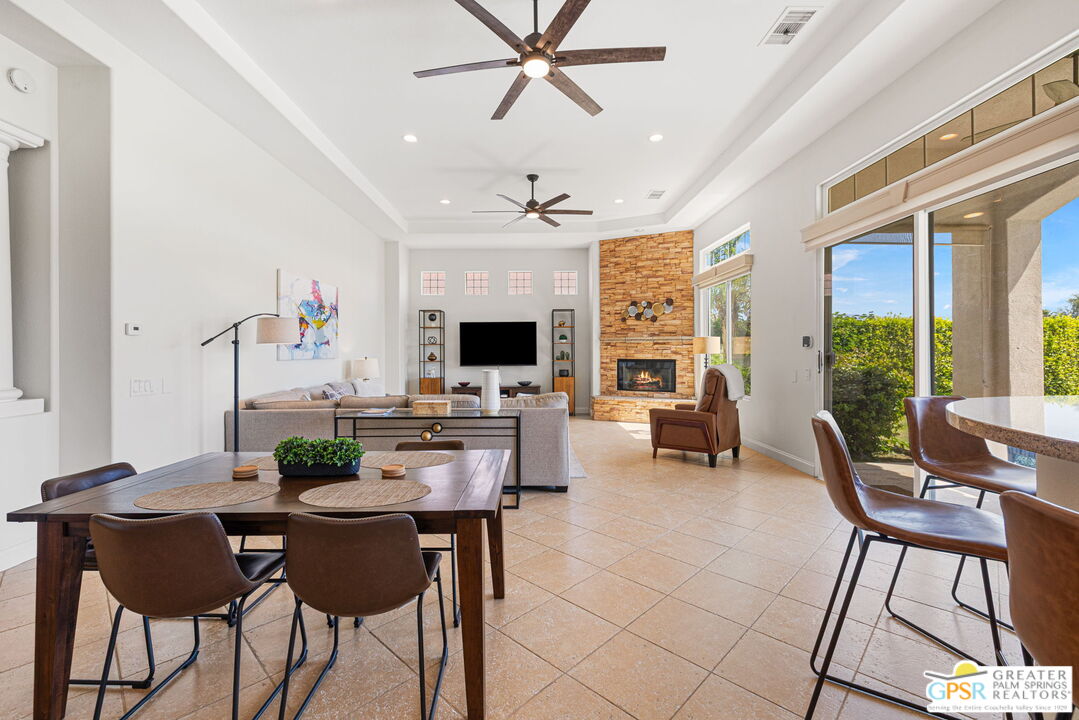 88 Vía Las Flores Rancho Mirage, CA 92270 - Photo 23 of 65 a view of a dining room with furniture window and outside view