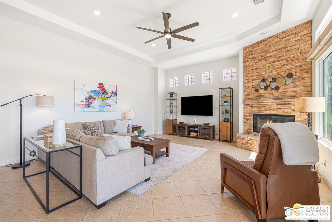 88 Vía Las Flores Rancho Mirage, CA 92270 - Photo 24 of 65 a living room with furniture and a flat screen tv