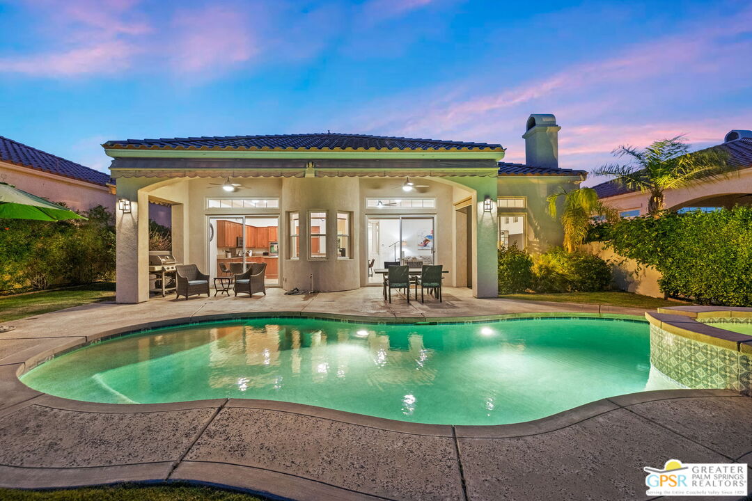 88 Vía Las Flores Rancho Mirage, CA 92270 - Photo 3 of 65 a view of a swimming pool with a patio