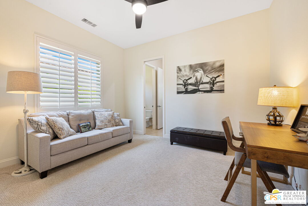 88 Vía Las Flores Rancho Mirage, CA 92270 - Photo 39 of 65 a living room with furniture and a window