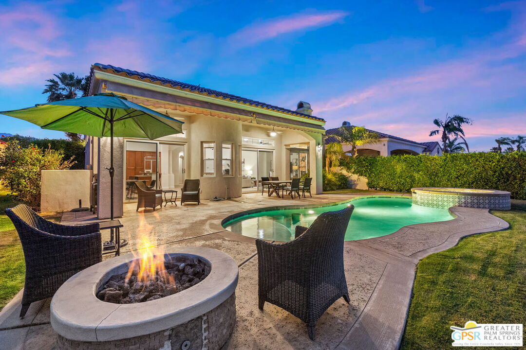 88 Vía Las Flores Rancho Mirage, CA 92270 - Photo 4 of 65 a view of a swimming pool with a patio