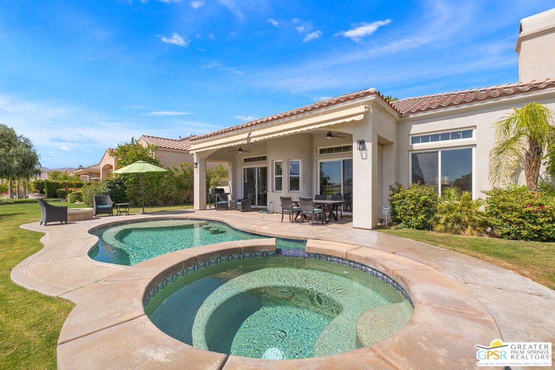 88 Vía Las Flores Rancho Mirage, CA 92270 - Photo 55 of 65 a view of a house with swimming pool and porch