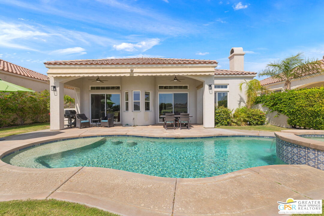 88 Vía Las Flores Rancho Mirage, CA 92270 - Photo 56 of 65 a view of a house with sitting area and garden view