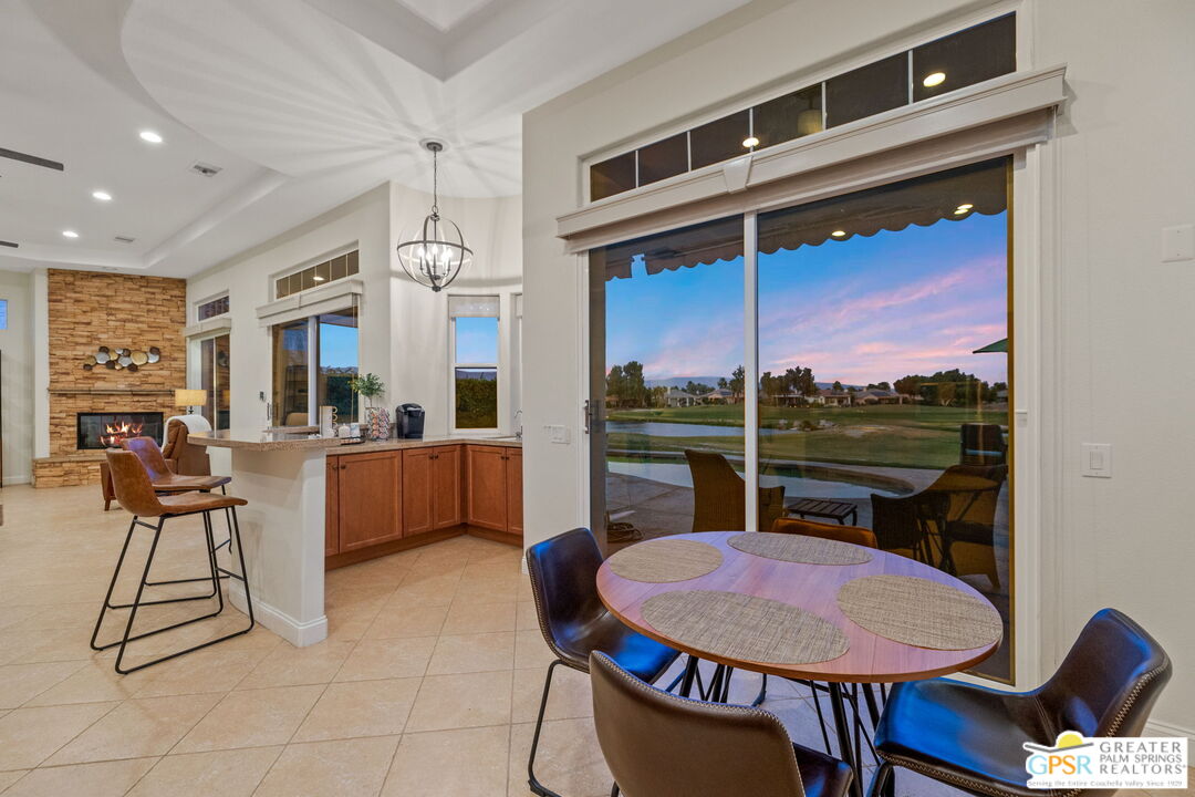 88 Vía Las Flores Rancho Mirage, CA 92270 - Photo 8 of 65 a view of a dining room with furniture