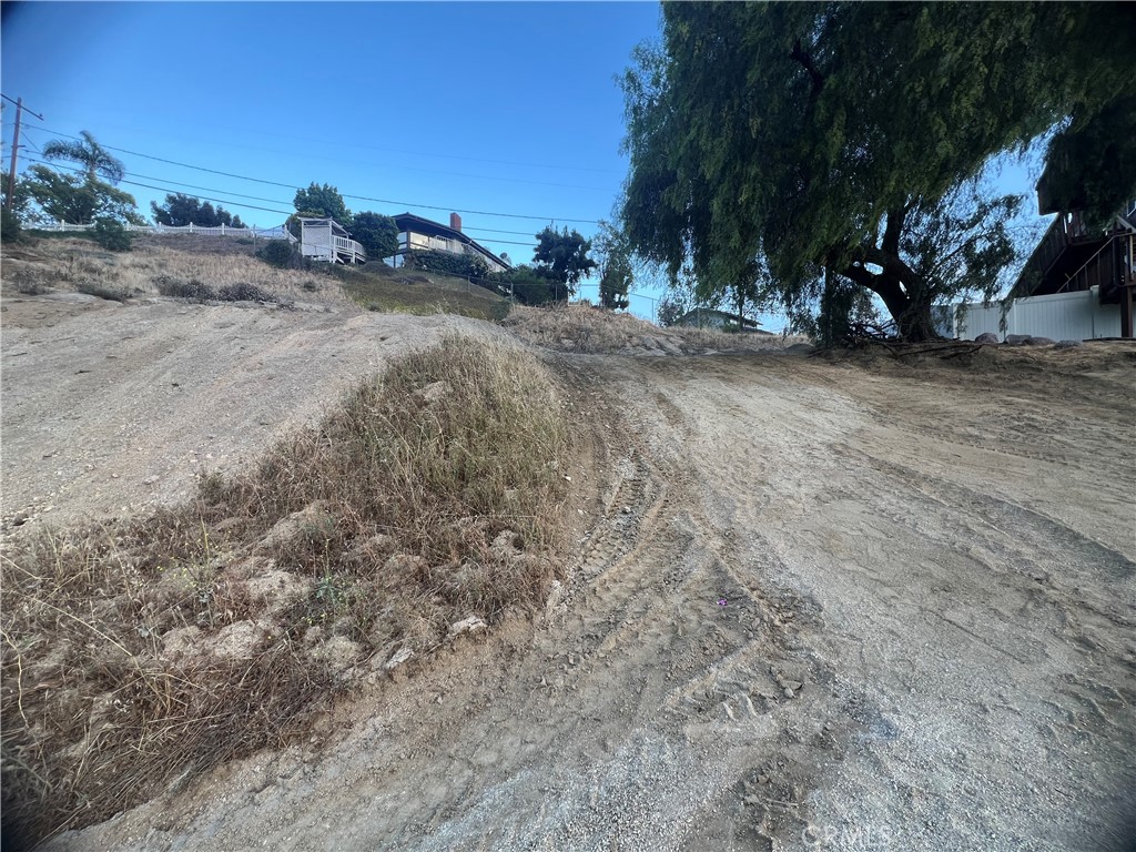 20254 West Point Drive Riverside, CA 92507 - Photo 2 of 7 a view of dirt yard with a tree