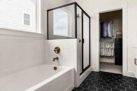 a bathroom with a sink toilet and mirror