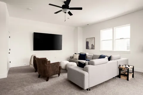 a view of a balcony with lake view and wooden floor