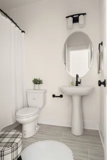 an aerial view of a house with a swimming pool