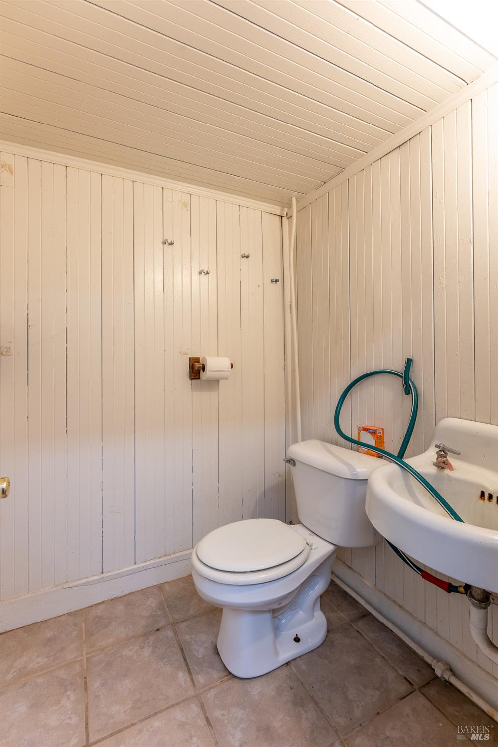 38 South Main Street Willits, CA 95490 - Photo 22 of 88 a bathroom with a toilet a sink and shower