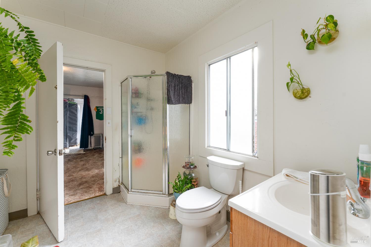 38 South Main Street Willits, CA 95490 - Photo 38 of 88 a bathroom with a sink toilet and shower