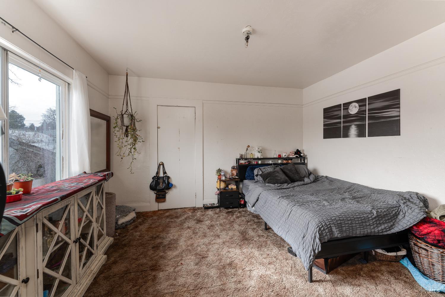 38 South Main Street Willits, CA 95490 - Photo 40 of 88 a bedroom with bed and a window