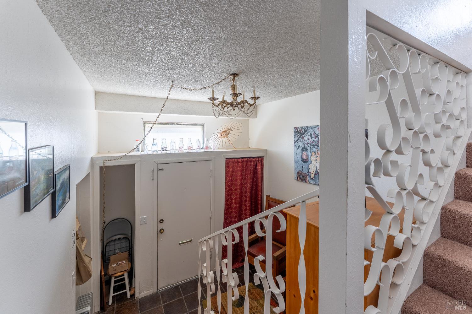 38 South Main Street Willits, CA 95490 - Photo 52 of 88 a view of a entryway with furniture and chandelier