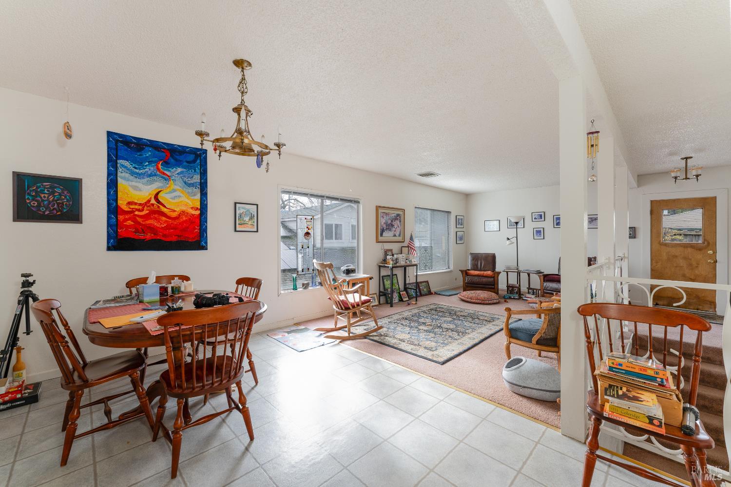 38 South Main Street Willits, CA 95490 - Photo 58 of 88 a living room with furniture kitchen view and a wooden floor