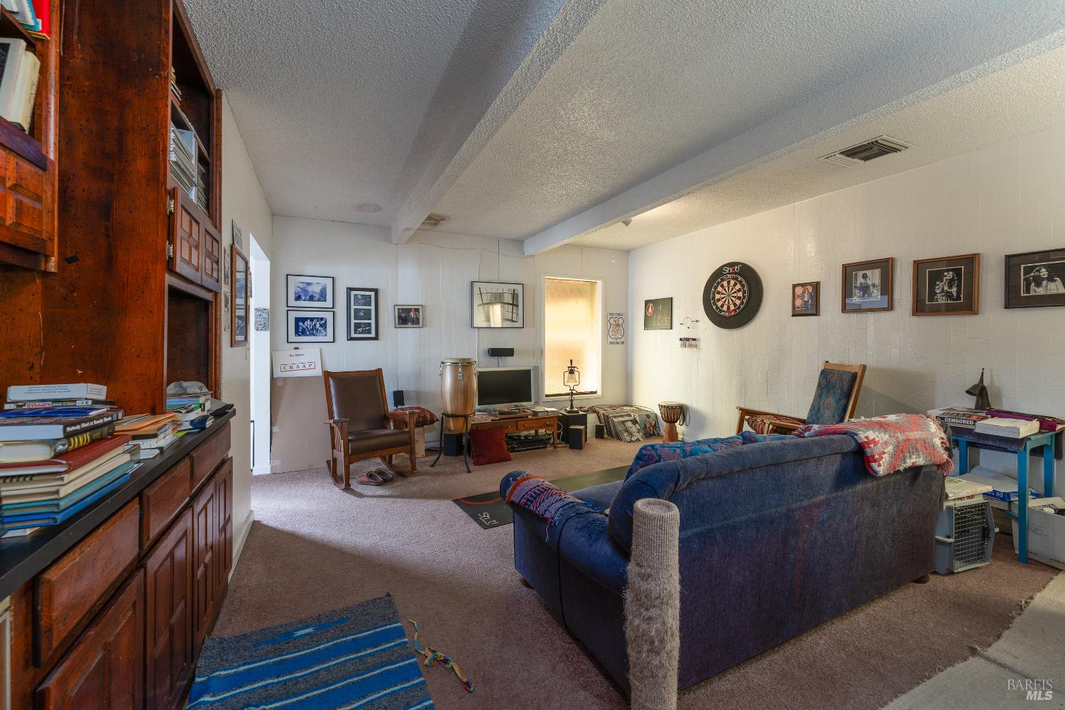 38 South Main Street Willits, CA 95490 - Photo 62 of 88 a living room with furniture and a flat screen tv