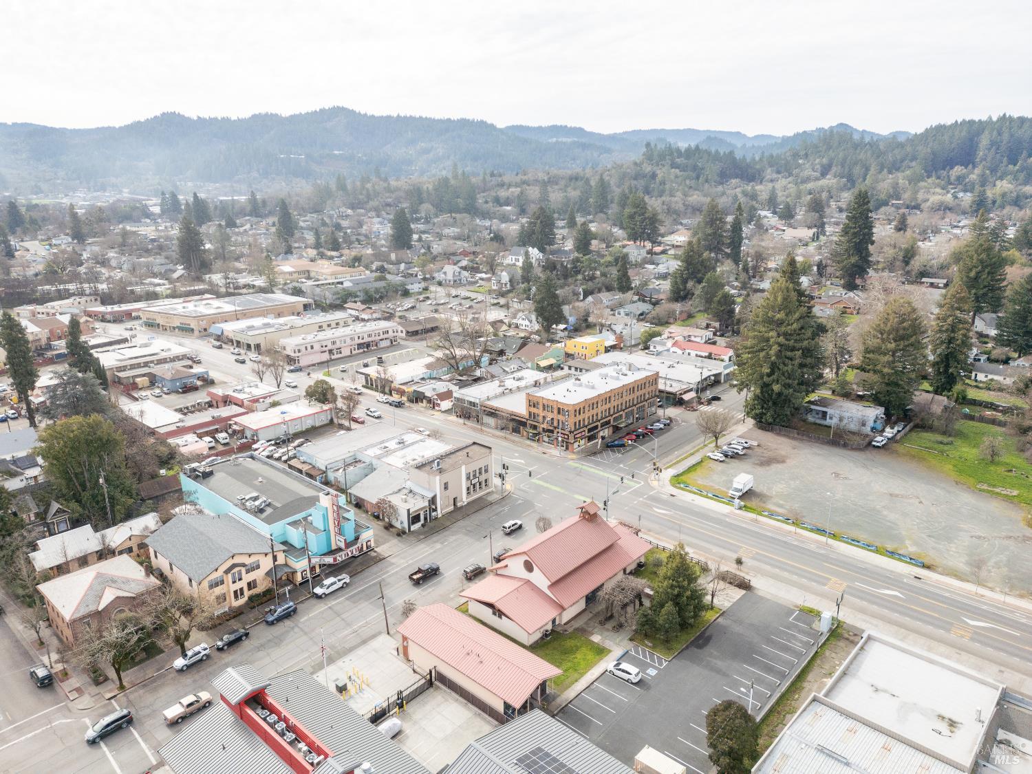 38 South Main Street Willits, CA 95490 - Photo 78 of 88 an aerial view of residential house with parking and trees