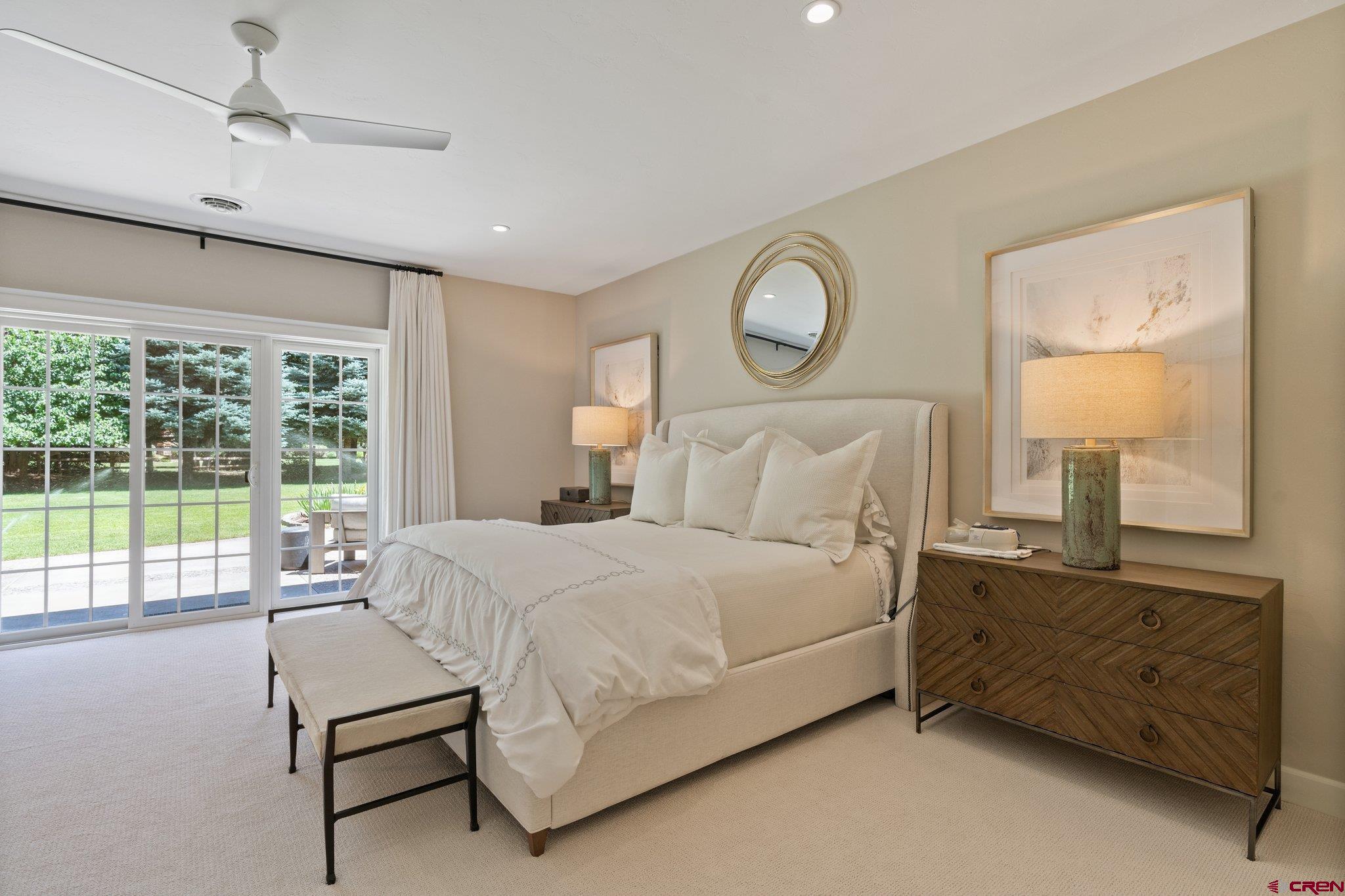 385 Red Rock Road Durango, CO 81301 - Photo 22 of 35 a bedroom with a bed and window