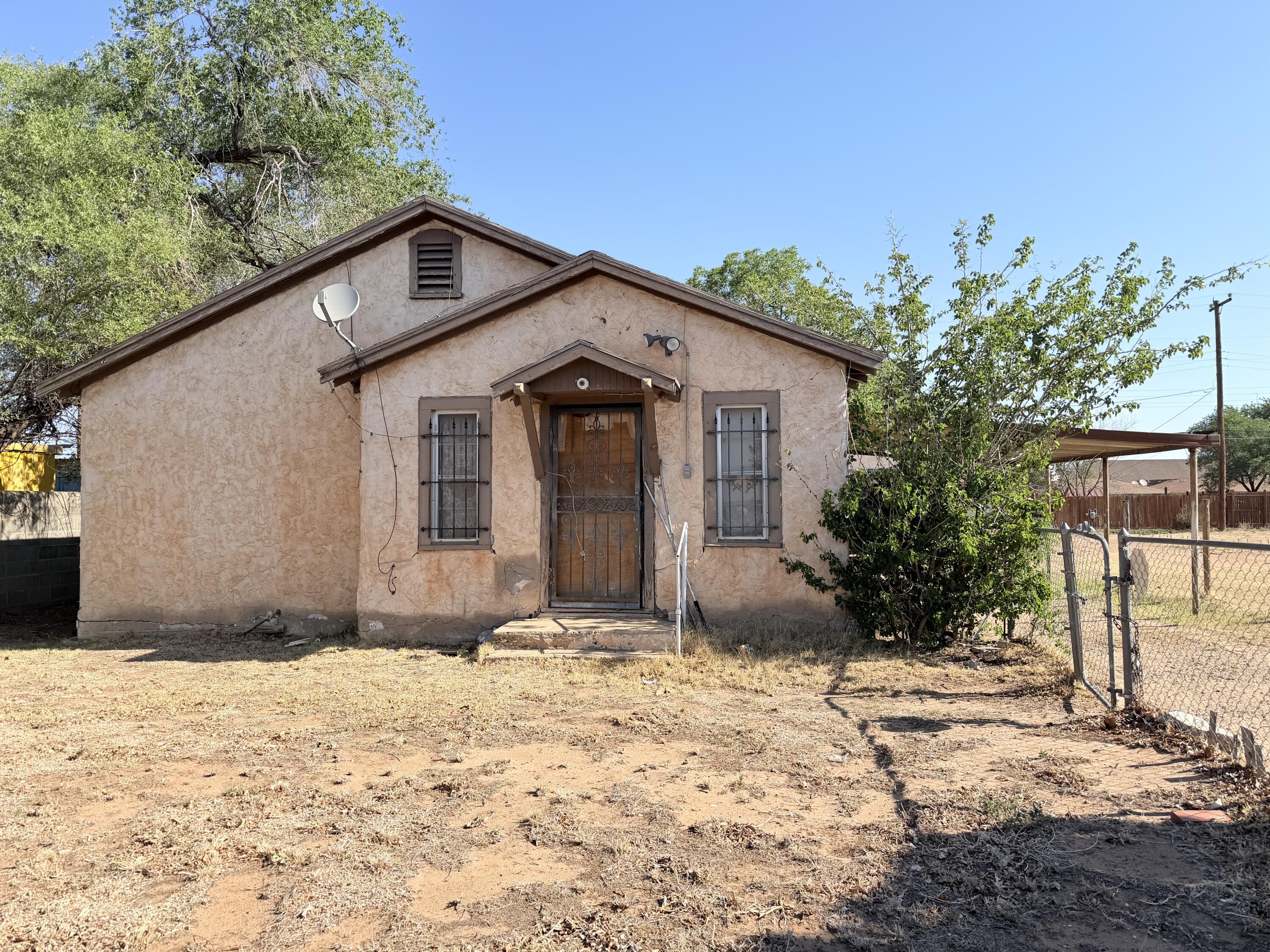 1612 46th Street Lubbock, TX 79412 - Photo 1 of 3 a view of a house with a yard
