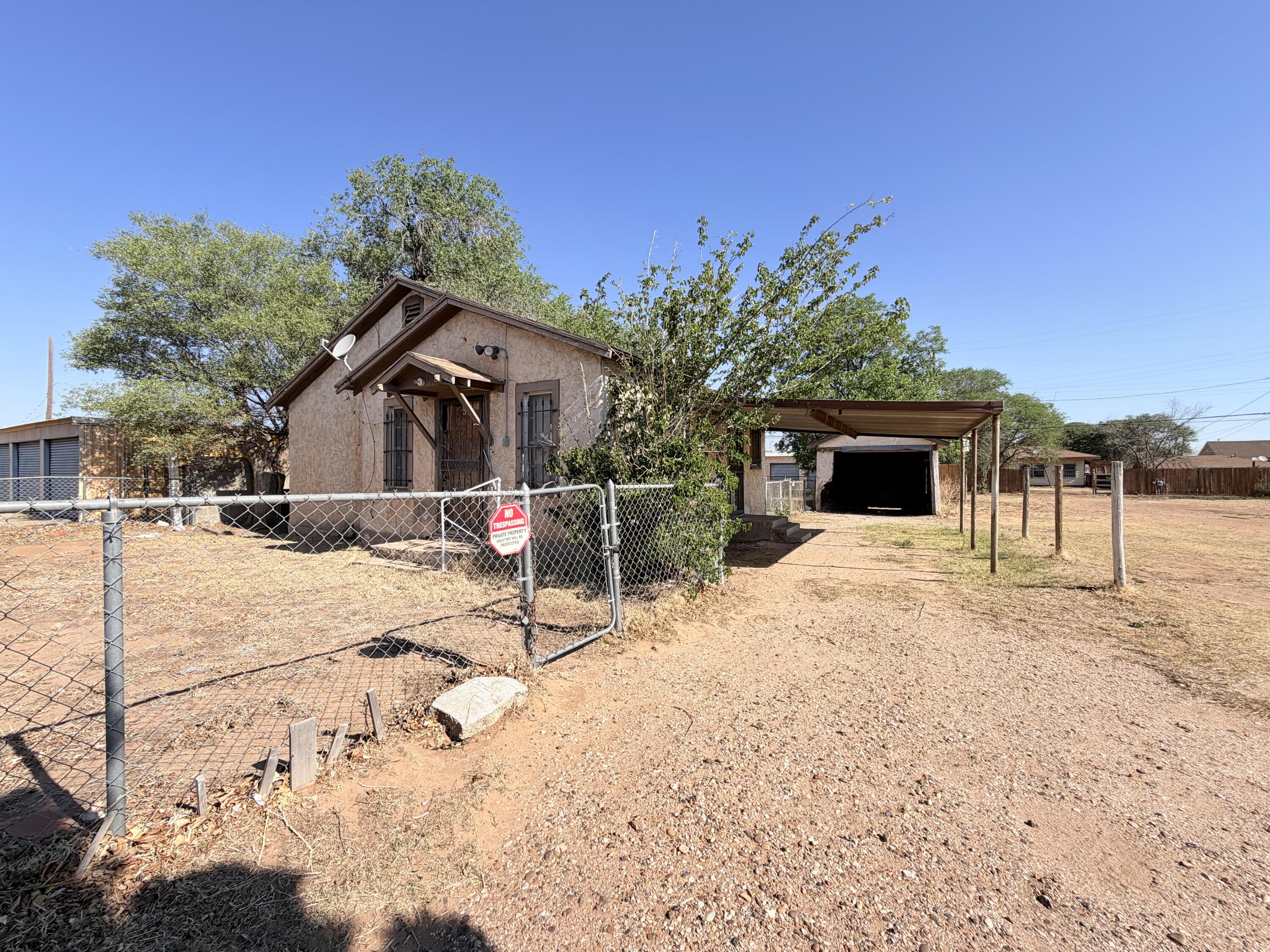1612 46th Street Lubbock, TX 79412 - Photo 2 of 3 a view of a house with a wooden fence